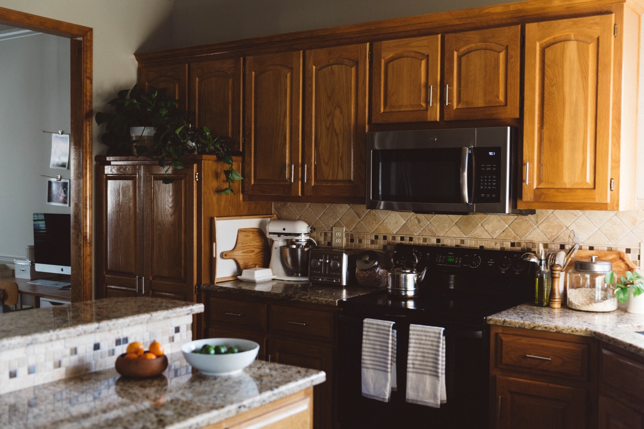 A Tour Of Our Rental Kitchen Rachael Alsbury   Rental Kitchen Honey Oak Cabinetry 